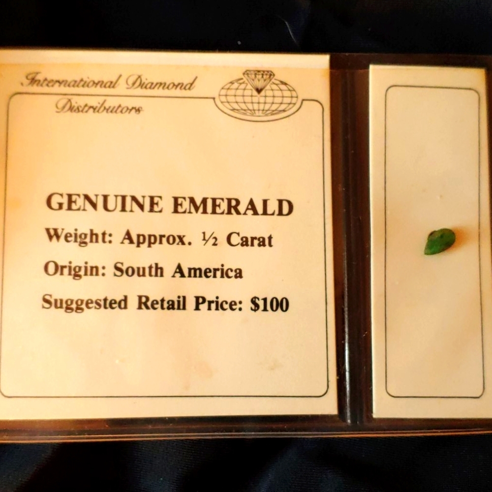1/2 carat pear shaped Emerald